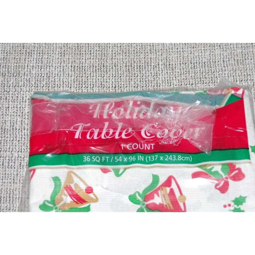 Vtg NOS Heavy Paper Christmas Tablecloth Bells AOP 54x96 Holly Green Gold Red